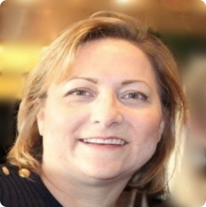 Professional headshot of Margit Kiraly Willford, TMS therapy specialist at TMS of the Carolinas